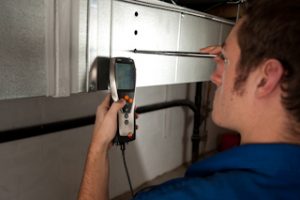 To upsize duct you need to measure. This tech is measuring static pressure.